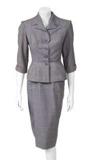Lot 717 - LAUREN BACALL SUIT FROM WOMAN‘S WORLD