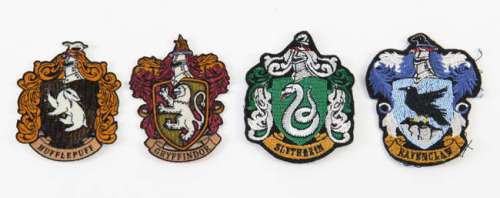 Harry Potter - Four original production made student robe test badges, Gryffindor, Hufflepuff,… | Ewbank’s