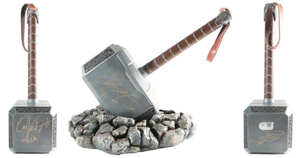 Chris Hemsworth as Thor, Cate Blanchett as Hela, & Taika Waititi as Korg / Director of Thor: Ragnarok (SWAU) Signed Heavy Metal & Leather Prop Replica Mjolnir Hammer with Character Name & Great Quote | SWAU