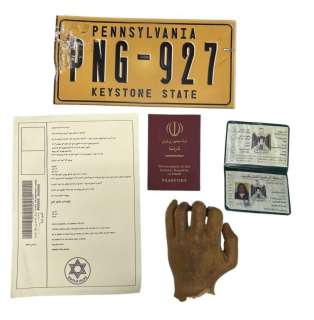 Lot 606 - World War Z (2013) - Collection of Props (Infected Hand, License Plate etc.)