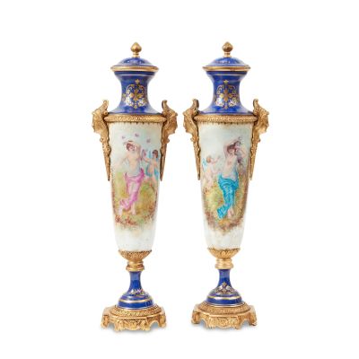Lot 169 - A pair of polychrome decorated and gilt metal mounted urns (2) | Bonhams