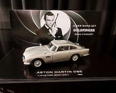 James Bond 007 - Goldfinger 1964 - Sean Connery - Aston Martin Db5 - Automobilia Art Exclusive | JAMES BOND 007 - GOLDFINGER 1964 - Sean Connery - Aston Martin DB5 - AUTOMOBILIA ART Exclusive - Collector’s item in a very limited edition of 30 pcs worldwide.- Serial -2/30 - 45x24CM - New Items - On the back of the base is a certificate of… | Catawiki
