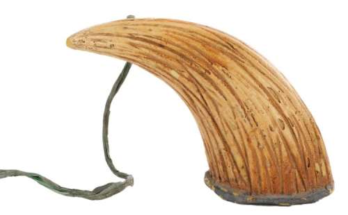 Lot 1527 - The Flintstones (4) stone age props including slingshot, hammer, money bag, phone receiver & baseball.