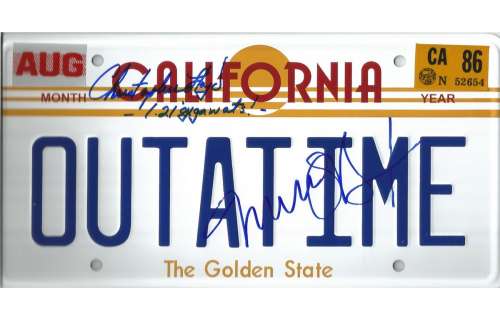 Back to the Future prop replica metal license tag from the famed Delorean signed on the tag by Micha | Piece of the Past