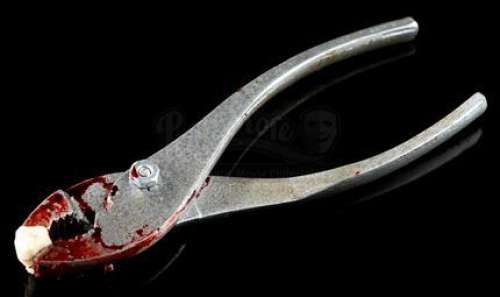 Hellraiser: Judgment | The Preceptor’s Tooth Extractor with Tooth | Propstore