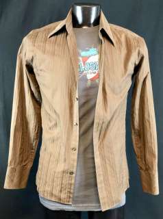 Lot 134 - Cloverfield (2008) - Mike Vogel Jason Hawkins Slusho Shirt Lot