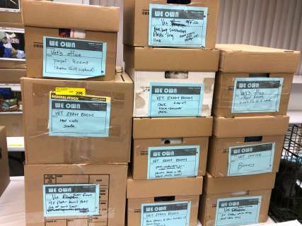 Lot 206 - 10 boxes from The Vet Clinic including scale, clock, books & trays