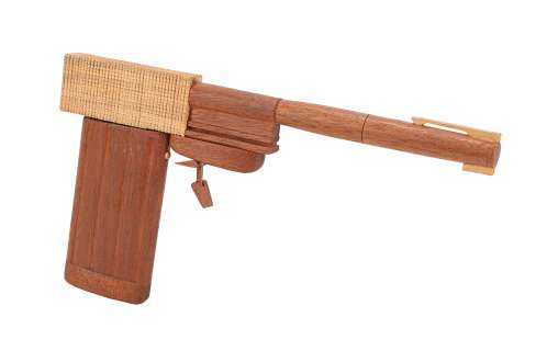 JAMES BOND: THE MAN WITH THE GOLDEN GUN (1974) - Lot 200 - Colibri-made Wooden Golden Gun Master Model