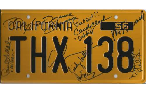 American Grafitti prop replica metal license tag signed on the tag by director George Lucas, Ron How | Piece of the Past