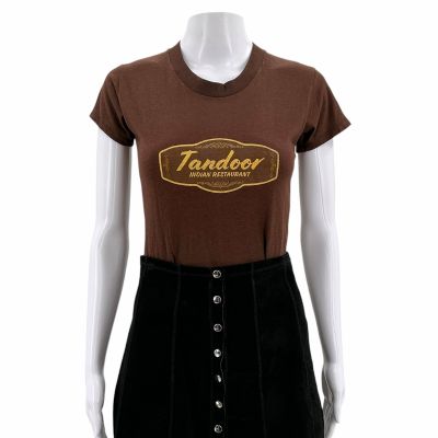 Lot 30: Poker Face Season 2 Charlie Cale (Natasha Lyonne) Screen Worn T-Shirt & Skirt Ch 2 Sc 15, 16 Ep 207 | VIP Fan Auctions