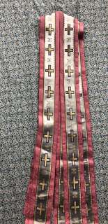 The American Horror Mystery-Thriller Show - Lot 233 - Rack lot of Priest Father Paul - Vestment / Cassock outfits - includes Father Paul staff / gold / bl
