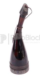 Star Trek: Deep Space Nine Quarks Saurian Brandy Bottle | The Prop Block