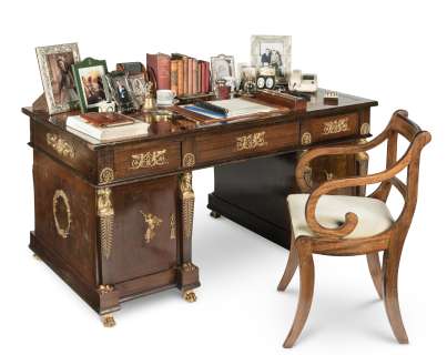 The Crown - Lot 104 - Dominic West (as Prince Charles): an Empire-style mahogany and gilt-metal mounted pedestal partner‘s desk First seen in Season 5, in the Charles Study at Highgrove set (qty)