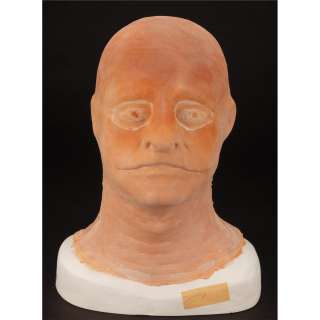 Lot 798 - Pair of snake metamorphosis masks from Sssssss