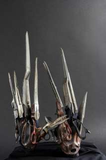 Lot 812 - JOHNNY DEPP SCISSORHAND PROPS GLOVES DISPLAY FROM EDWARD SCISSORHANDS