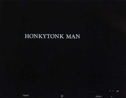 Lot 1107 - Honkytonk Man opening title card with Escape from Alcatraz and Any Which Way You Can rollup titles.