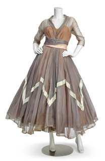 A Maureen O’Hara organza gown, together with a navy cocktail dress, both worn on an episode of The Dinah Shore Chevy Show, 1957 | Bonhams