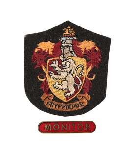 HARRY POTTER AND THE DEATHLY HALLOWS: PART 2 (2011) - Lot 166 - Gryffindor House Patch and "Monitor" Badge
