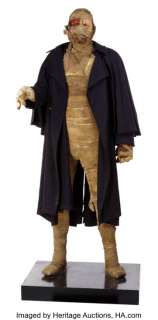 Liam Neeson "Darkman" life-size figure with screen-used costume and prosthetic face and wig from Darkman. ...