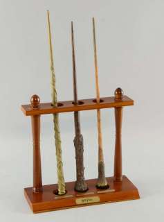 Harry Potter, Three official licensed promotional wands with stand for the release of the first… | Ewbank’s
