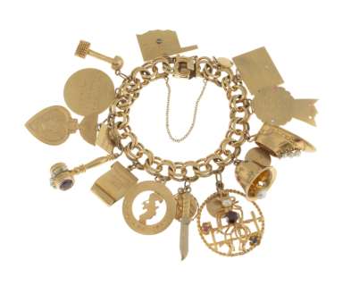 Lot 15 - JAMES GARNER: "THIS IS YOUR LIFE" 14K GOLD CHARM BRACELET AND SIGNED CARD WITH RALPH EDWARDS-SIGNED CORRESPONDENCE