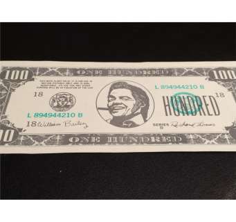 Back to the Future II movie prop Biff 100 dollar bill seen on screen in the film | Piece of the Past