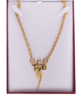 Elvis - Lot #330 - "TCB" Necklace with Baz Luhrmann Signed Box