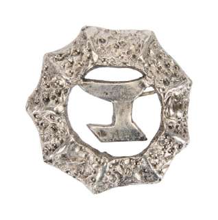 Lot 73 - Star Trek VI: The Undiscovered Country | Christopher Plummer "General Chang" Klingon Emblem Pin