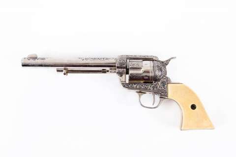 BURT REYNOLDS NON-FIRING PROP GUN WITH ENGRAVED NICKEL FINISH | Julien’s