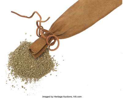 Clint Eastwood "Pardner" prop pouch and "gold" from Paint Your Wagon....