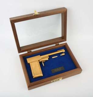 James Bond The Man With The Golden Gun - A replica golden gun, 24 karat gold-plated replica… | Ewbank’s