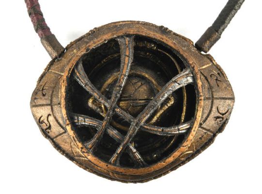 Lot 5151 - Doctor Strange (2016) Production-made Eye of Agamotto necklace/prop from the Marvel Cinematic…