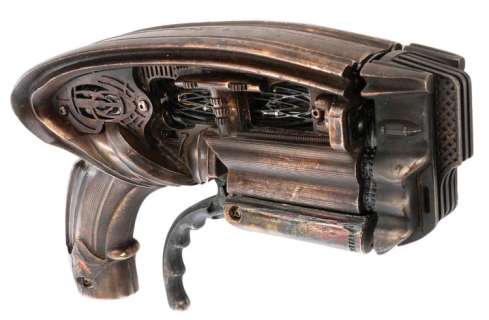 Lot 1739 - "Necromonger" hero prop gun from The Chronicles of Riddick.