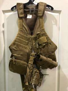 "Superhero Show" - Group of 7 brown vests w/ammo belts & protective gears | Direct Liquidation
