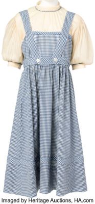 The Wizard of Oz (MGM, 1939), Judy Garland "Dorothy Gale" Original Signature Crème Blouse from the Film Production of The Wizard of Oz Accompanied by a Gingham Dress Used for Touring Purposes. | Heritage