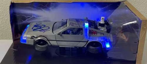 Back to the Future - DeLorean Timemachine Model Car - Double signed by Michael J. Fox & Christopher Lloyd - with Beckett | Catawiki