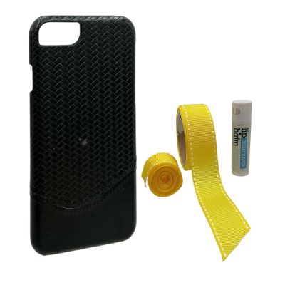 Lot 9: Everything Everywhere All at Once (2022) Waymond Wang (Ke Huy Quan) Screen Used Phone Cover, Lip Balm & Ribbon Roll | VIP Fan Auctions