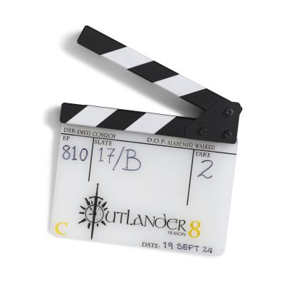 Outlander | A small clapperboard used in the production of the final episode of the eighth season of Outlander Season 8, Episode 10, ’And The World Was All Around Us’ | Bonhams