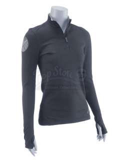 Marvel‘s Agents of S.H.I.E.L.D. - Lot 58 - Pair of Melinda May‘s Stunt S.H.I.E.L.D. Shirts