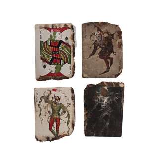 Dark Knight, the (2008) | Four Burnt Joker Cards | Propstore