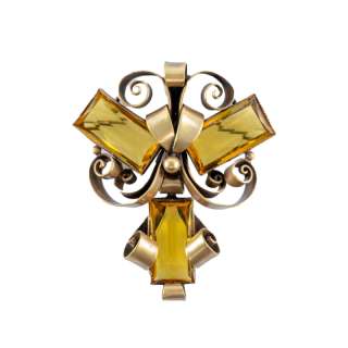 Lot 573 - MYRNA LOY: "SHADOW OF THE THIN MAN" FILM-WORN BROOCH