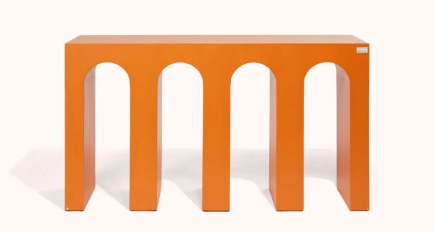 And Just Like That… | Lot #125 - LTW’s Arched Orange Console Table | Julien’s