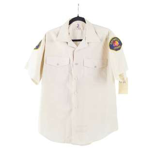 David Hasselhoff "Mitch Buchannon" Short Sleeved Dress Shirt and (2) Badges from Baywatch - Studio Auctions COA, Baywatch Production Company COA