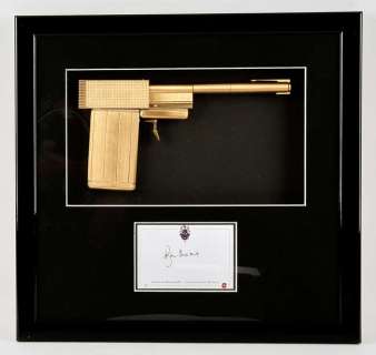 James Bond The Man With The Golden Gun (1974) - A replica golden gun display, mounted inside a… | Ewbank’s