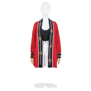 The Crown - Lot 422 - Elizabeth Debicki (as Princess Diana): A knitted cardigan and shorts ensemble Season 6, Episode 1, ‘Persona Non Grata‘