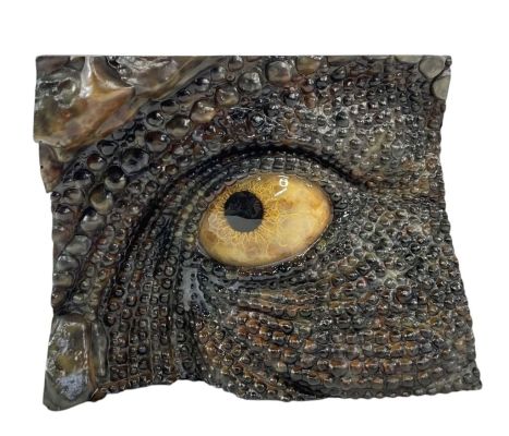 Lot 86 - Jurassic Park (1993) - Tyrannosaurus Rex Reference Eye in Socket Display