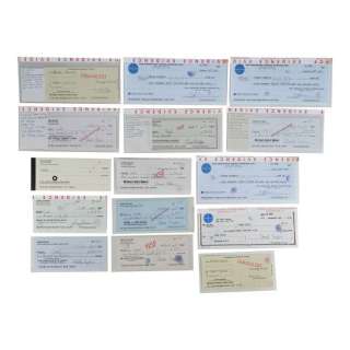 CATCH ME IF YOU CAN (2002) - Lot #684 : Set of Frank Abagnale, Jr.‘s (Leonardo DiCaprio) Forged Checks, Checkbook, and Pan Am Envelope