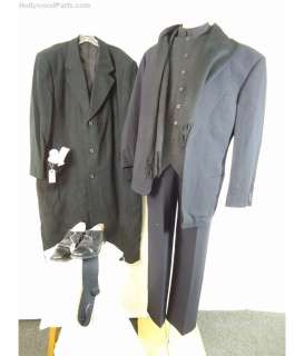 Lot 172 - STIGMATA FATHER ANDREW KIERNAN (GABRIEL BYRNE) PRIEST SUIT WITH COAT, GLOVES, AND SCARF