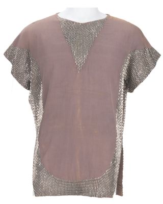 Lot 21 - John Wayne’s "The Conqueror" Costume Top. | Van Eaton Galleries