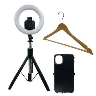 Eddington Joe (Joaquin Phoenix) Screen Used Ring Light, Wooden Hanger & Phone Case | VIP Fan Auctions